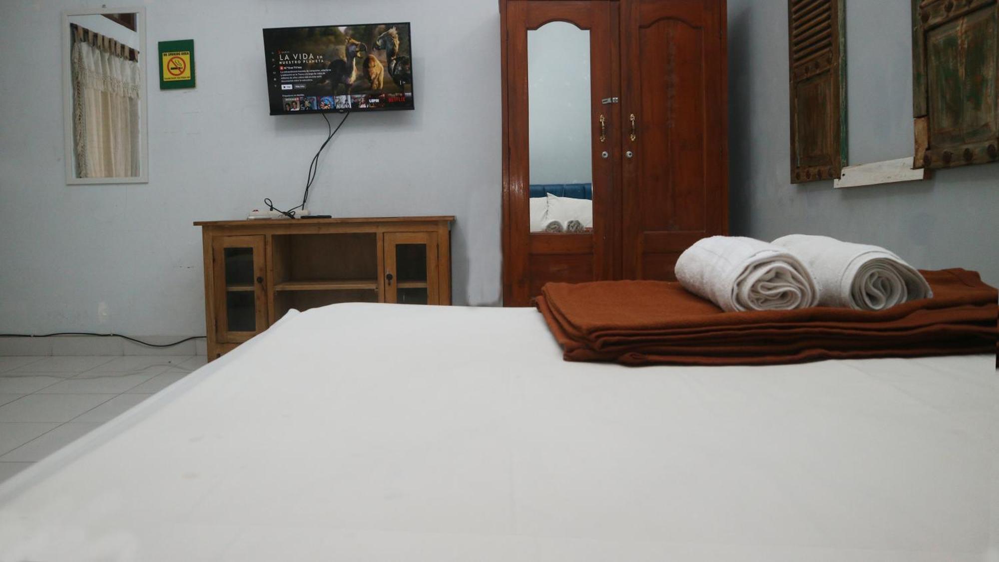 Budarno Homestay Kejayan Phòng bức ảnh