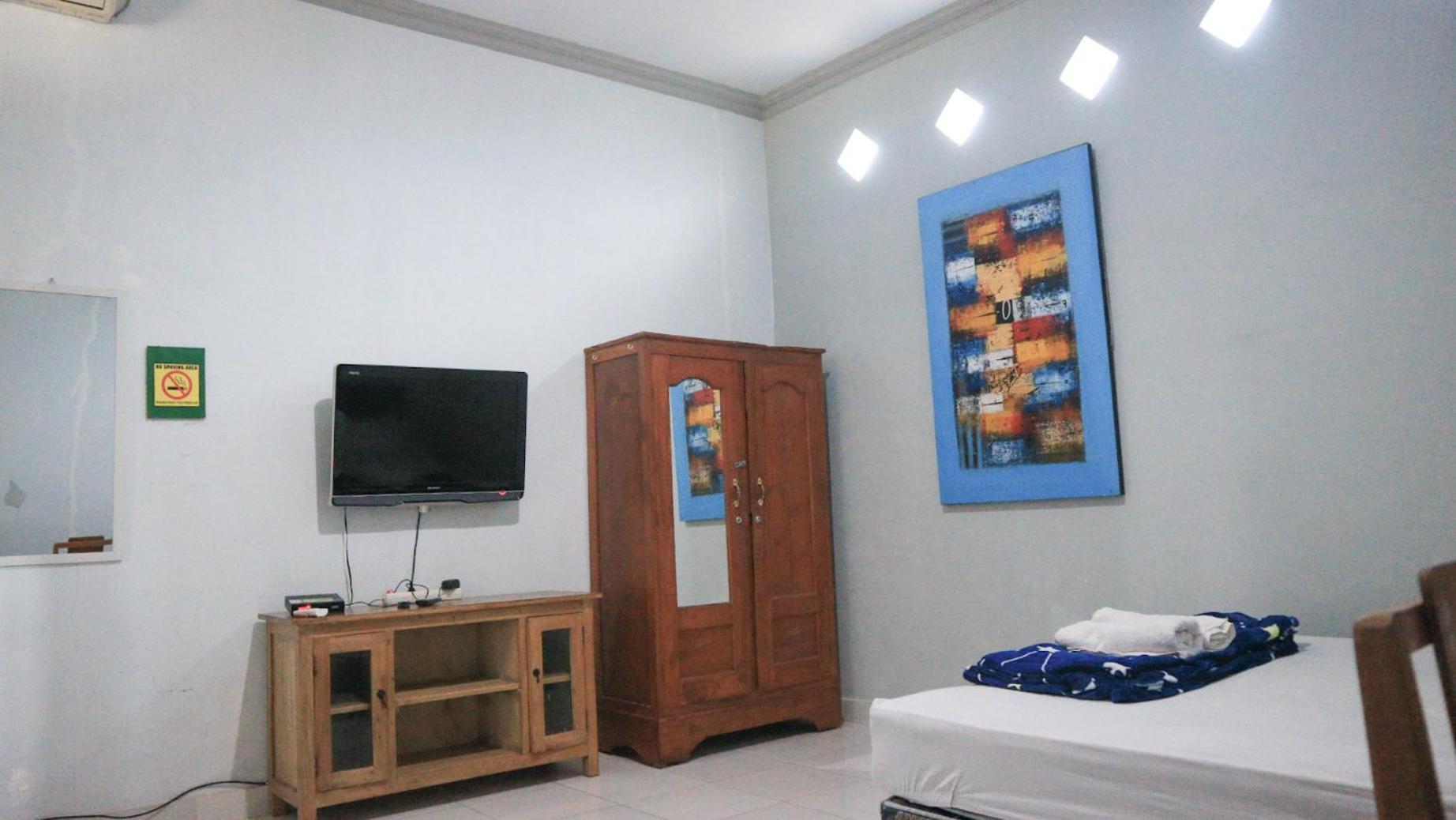 Budarno Homestay Kejayan Phòng bức ảnh